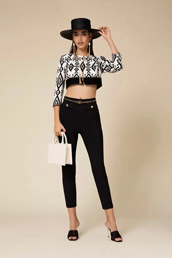 ELISABETTA FRANCHI Pantalone affusolato con catena